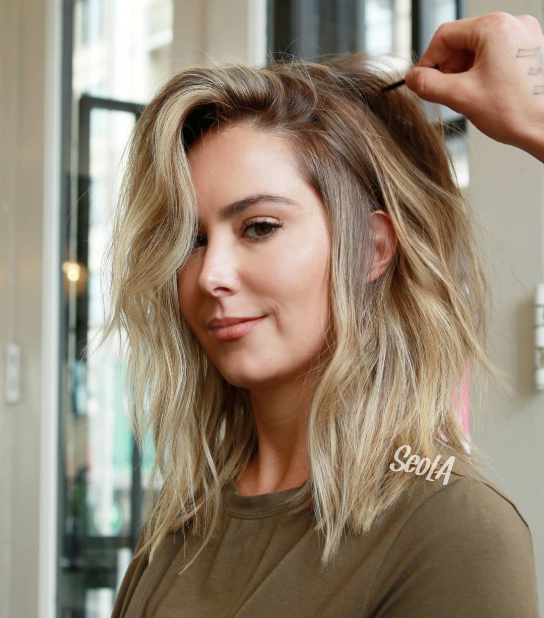 Soft Shaggy Blonde Lob Hairstyle